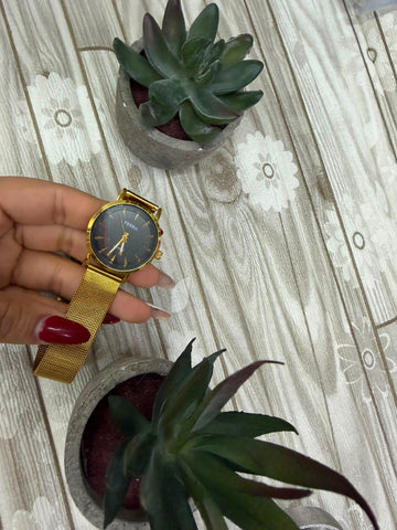 Reloj Fossil Dorado esfera negra